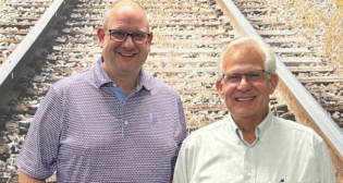 Pictured: Dan Marks (left), CEO of Bohr Electronics, and Stephen Smith, Founder and President of Central Railway Manufacturing. During the transition of CRM’s assets to Bohr Electronics, Smith will serve as a consultant.