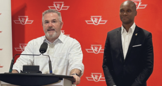 TTC CEO Rick Leary (left) with Chair Jamaal Myers during the June 7 announcement of the TTC-ATU Local 113 tentative agreement that avoided a strike. (TTC Photograph)
